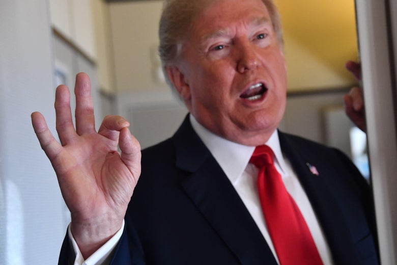 US President Donald Trump speaks to the press aboard Air Force One on September 7, 2018, as he travels to Fargo, North Dakota, to speak at a Joint Fundraising Committee. (Photo by Nicholas Kamm / AFP) (Photo credit should read NICHOLAS KAMM/AFP/Getty Images)